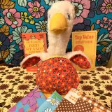 画像: Eden社  Apron duck rattle stuffed toy